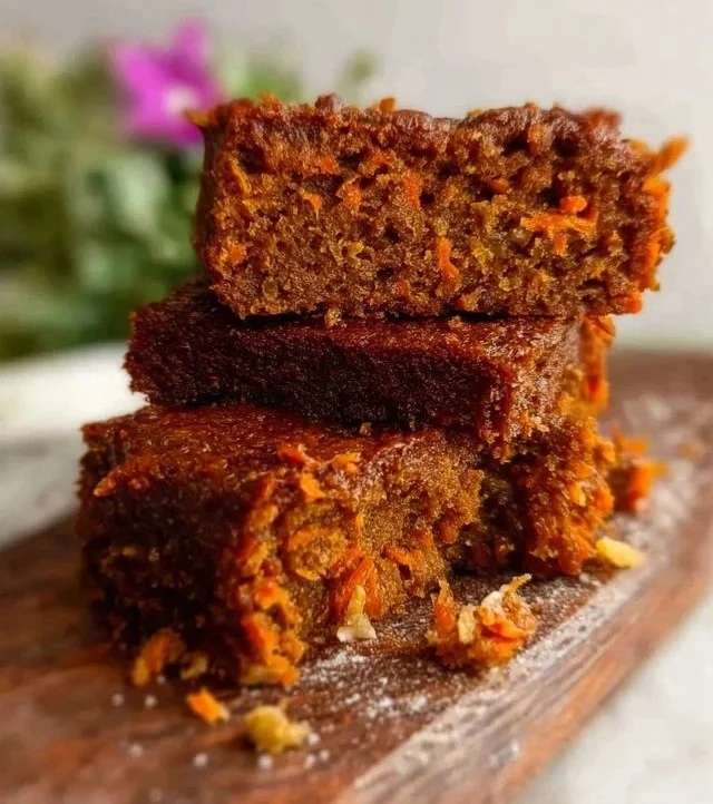 Slice of easy flourless oatmeal carrot cake on a plate with a fork
